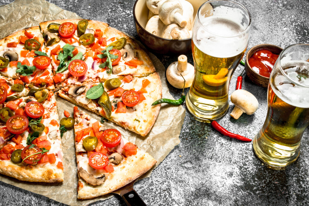 Mexican,Pizza,With,Cold,Beer.,On,A,Rustic,Background.