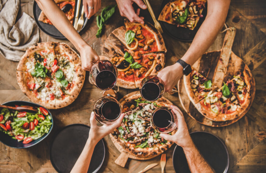 Family,Or,Friends,Having,Pizza,Party,Dinner.,Flat-lay,Of,People